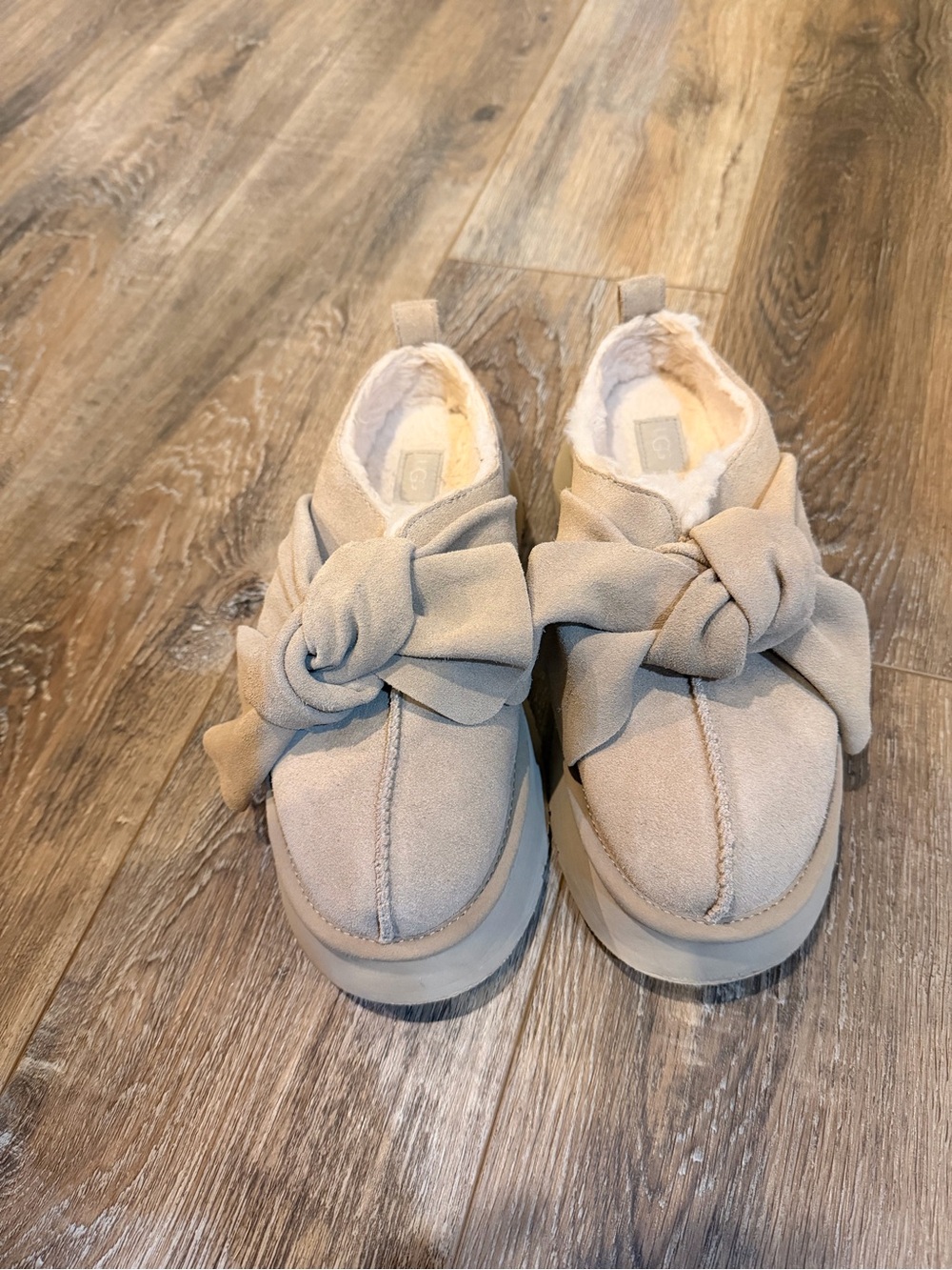 UGG Women's Bow-Accent Platform Slip-Ons in Light Beige